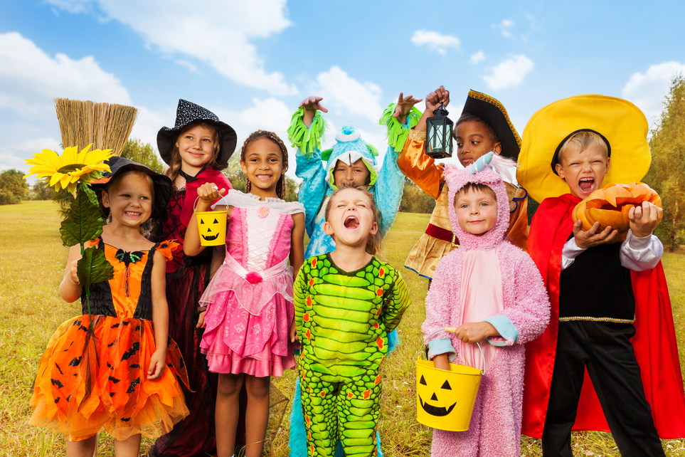 Happy Excited Kids in Halloween Costumes